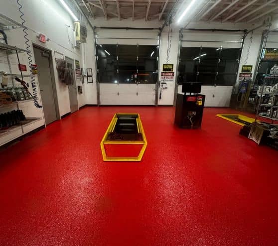 solid red epoxy flooring for Take 5 Oil Change