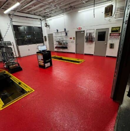 Take 5 Oil Change with solid red epoxy flooring installed