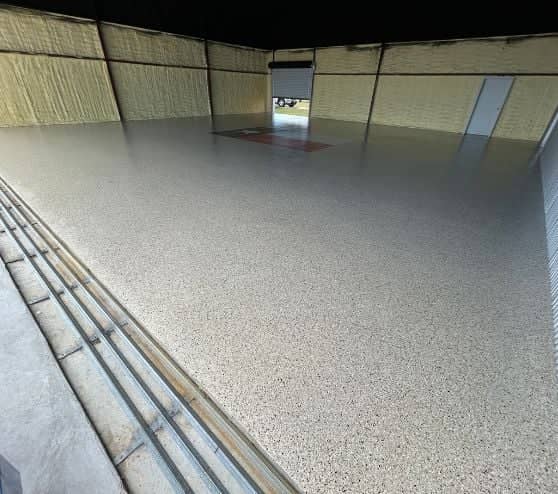 new Camel Epoxy Flake Flooring for homeowner hangar