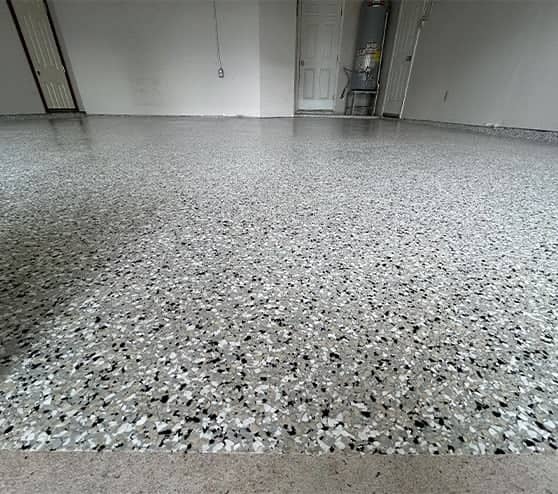 close-up of epoxy flake flooring installed for homeowner garage