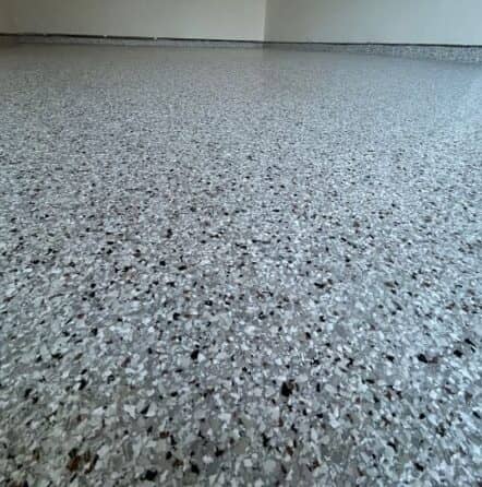 close-up of epoxy flake flooring installed for homeowner garage