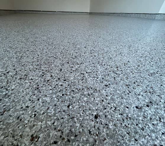 close-up of epoxy flake flooring installed for homeowner garage