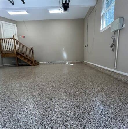homeowner garage with new epoxy flake flooring