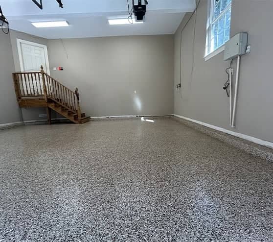 homeowner garage with new epoxy flake flooring