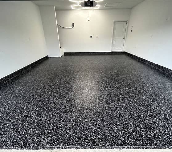 homeowner garage with new epoxy flake flooring