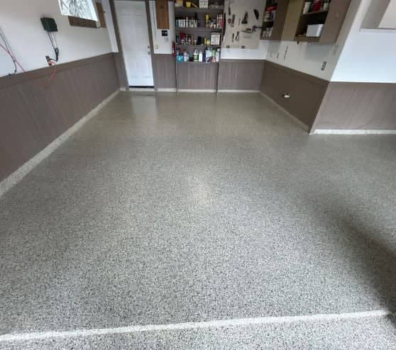 epoxy flake flooring installed for homeowner garage