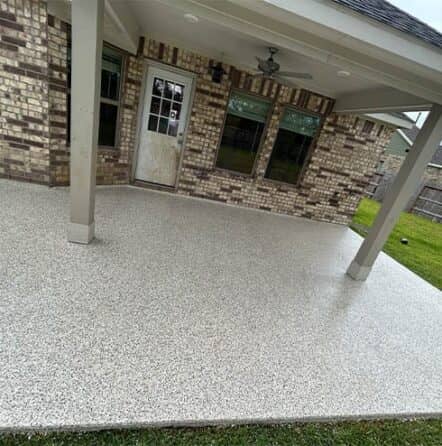 homeowner patio with freshly poured epoxy flake flooring