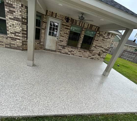 homeowner patio with freshly poured epoxy flake flooring