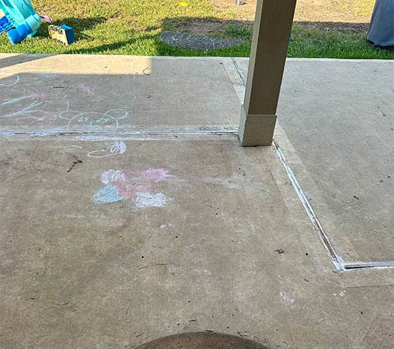 homeowner patio before epoxy flake flooring