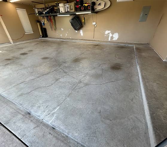 homeowner garage before new epoxy flooring is installed