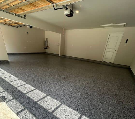 homeowner garage with new epoxy flooring installed