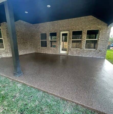 homeowner back patio with new epoxy flake flooring installed