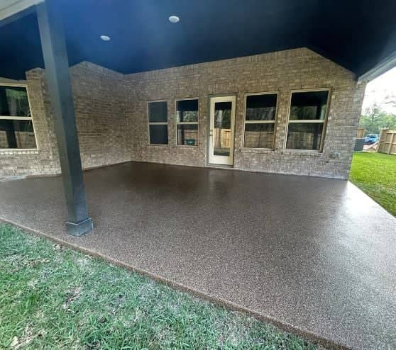 homeowner back patio with new epoxy flake flooring installed