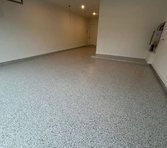 homeowner 2 car garage with new Lunar Epoxy Flake Flooring installed