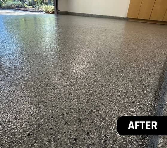 close-up of grey epoxy flake flooring for homeowner garage in texas
