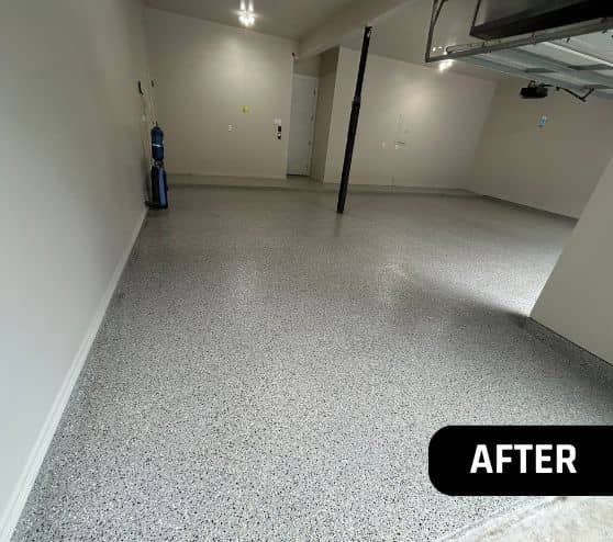 homeowner garage with new epoxy flooring installation after portrait
