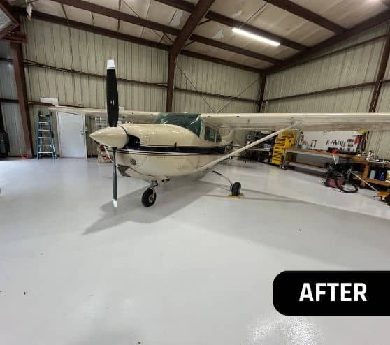 after portrait of airplane parked on new solid epoxy flooring