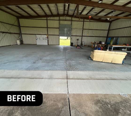 before portrait of airplane hangar with old concrete flooring