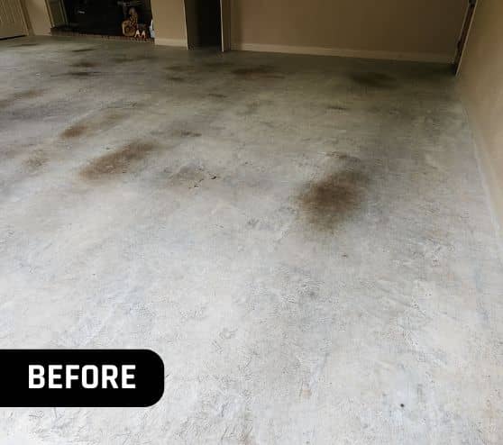 before portrait of homeowner garage with black stains