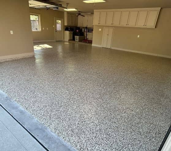 homeowner garage with Saddle Tan Epoxy Flake Flooring installed