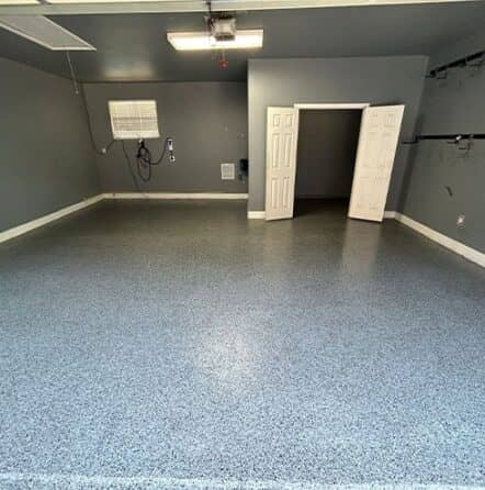 slate gray epoxy flake flooring freshly installed for homeowner