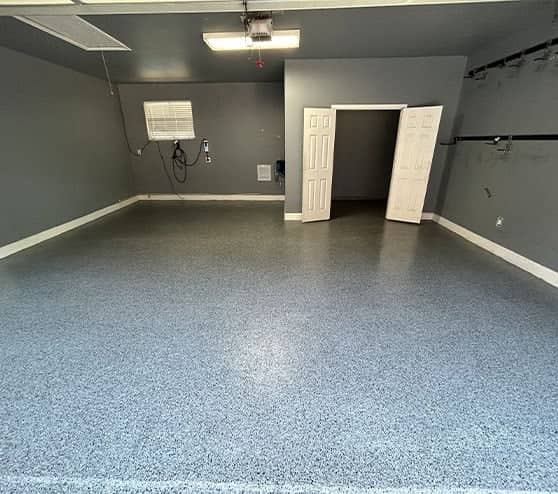 slate gray epoxy flake flooring freshly installed for homeowner