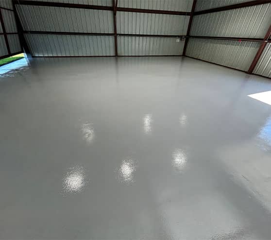 freshly installed epoxy flooring for Aircraft Hangar
