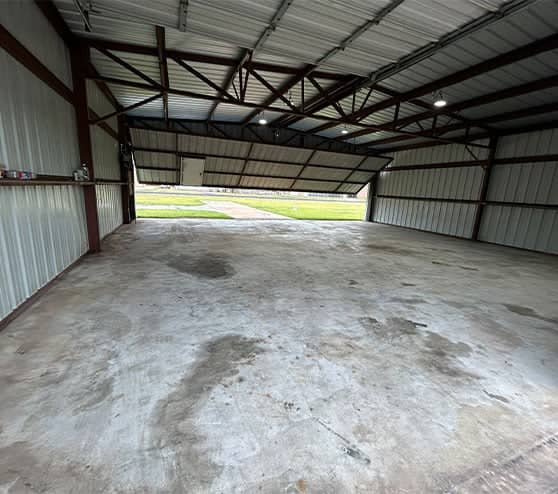 Aircraft Hangar old flooring before new epoxy flooring installed