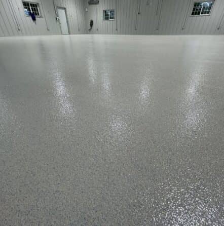 homeowner hangar with solid epoxy flooring installed