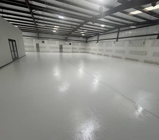 Kenneth's Car Care with new solid epoxy flooring