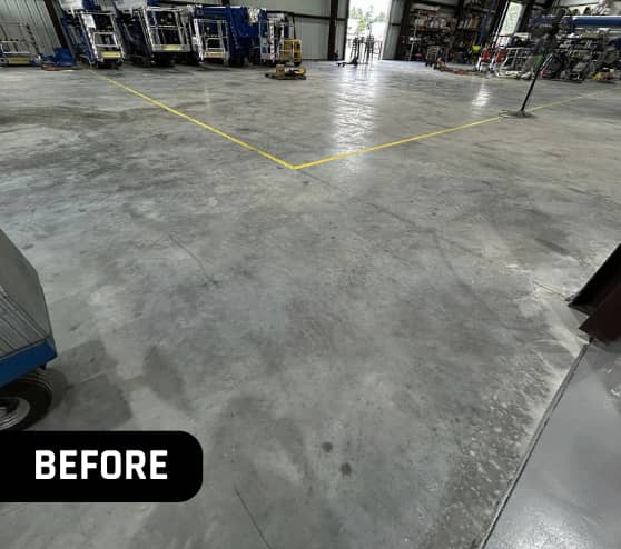 Before Solid Epoxy Flooring Project for Versalift and Ruthmann Reachmaster in New Caney, TX