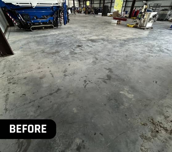 Before Solid Epoxy Flooring for Versalift and Ruthmann Reachmaster in New Caney, TX