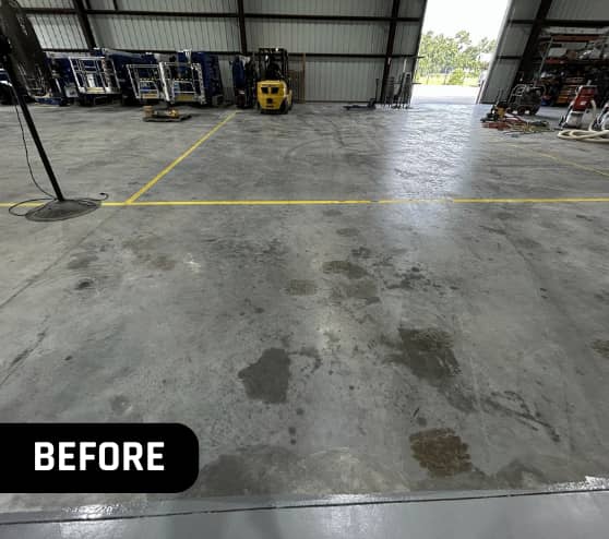 Before Solid Epoxy Flooring Work for Versalift and Ruthmann Reachmaster in New Caney, TX