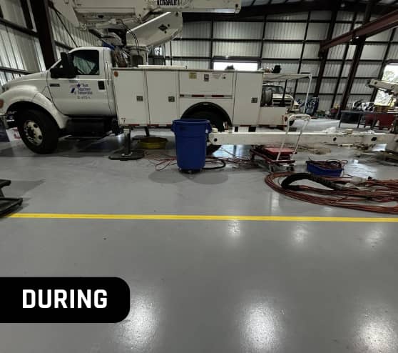 During Solid Epoxy Flooring Project for Versalift and Ruthmann Reachmaster in New Caney, TX