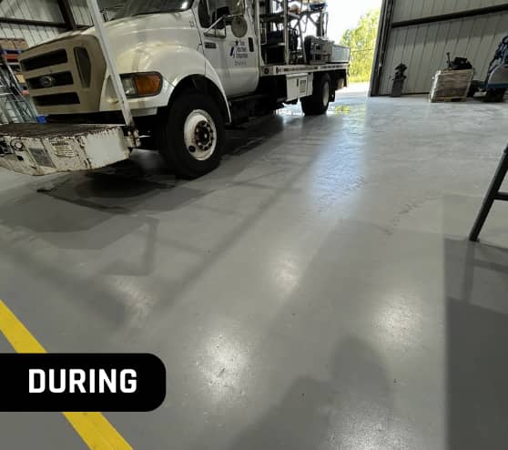 During Solid Epoxy Flooring for Versalift and Ruthmann Reachmaster in New Caney, TX