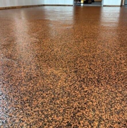 close-up of custom epoxy flake flooring for commercial building