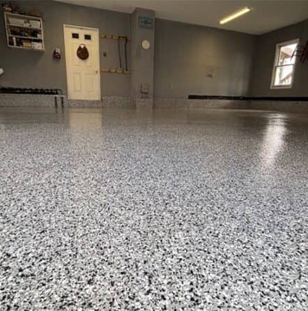 close-up of epoxy flake flooring for homeowner garage