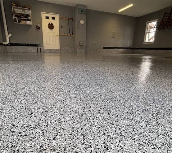 close-up of epoxy flake flooring for homeowner garage
