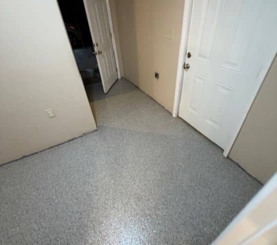 Creekbed Epoxy Flake Flooring installed for homeowner hallway
