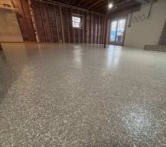 custom epoxy flake flooring close-up installed for homeowner basement