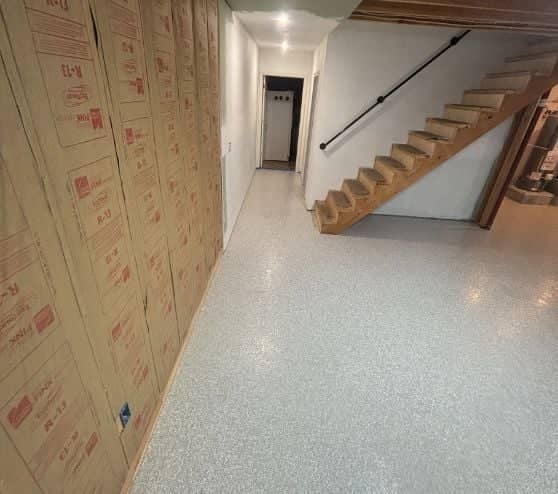 homeowner basement with new epoxy flooring installed