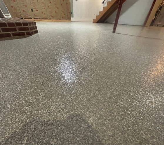 close-up of epoxy flake flooring installed for homeowner basement