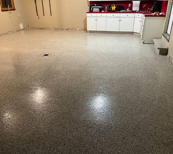 homeowners garage with new epoxy flooring