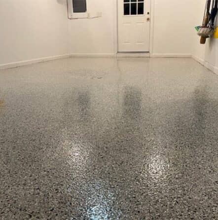 homeowner garage with new epoxy flake flooring