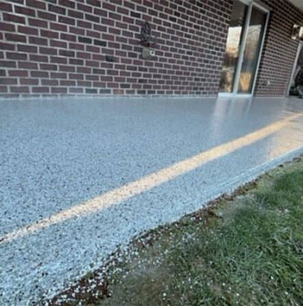 homeowner patio with new epoxy flake flooring