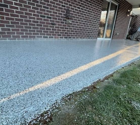 homeowner patio with new epoxy flake flooring