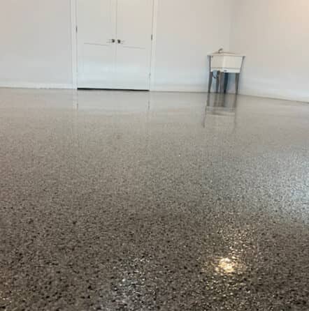 homeowner garage with new epoxy flake flooring