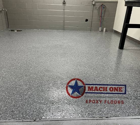 close-up of West End Fire Rescue flooring with new epoxy flake flooring