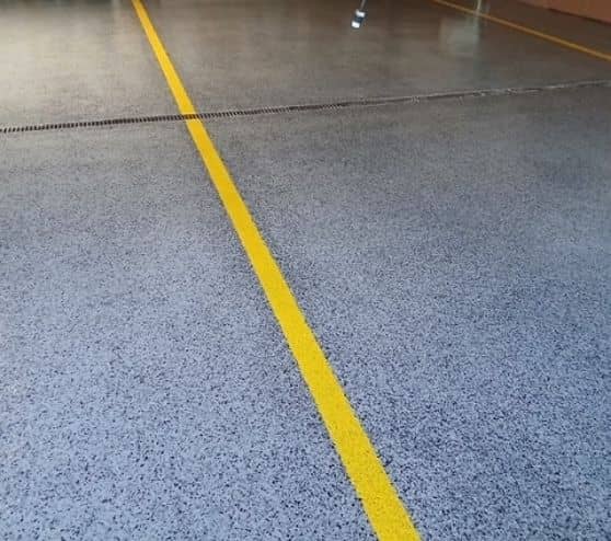 close-up of Graphite Epoxy Flake Flooring for Volunteer Fire Department freshly installed