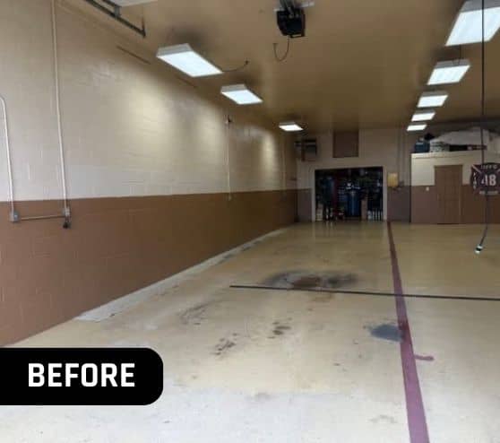 before portrait of Volunteer Fire Department garage with old flooring